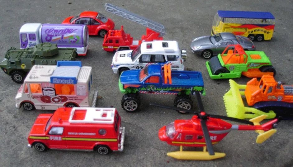 A red fire engine with a water cannon, illustrating the difference between benefits and features.